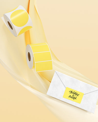 Yellow 2.25 x 1.25-inch rectangle labels printed on MUNBYN label printer paper, ready for labeling or organization.