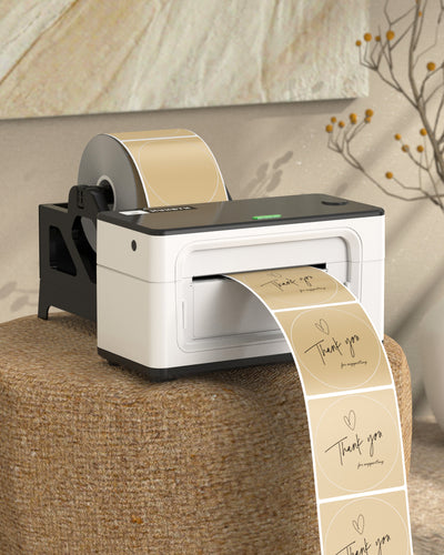 Three 3-inch circular labels printed on MUNBYN label printer paper, showing vibrant, clear designs on white background.
