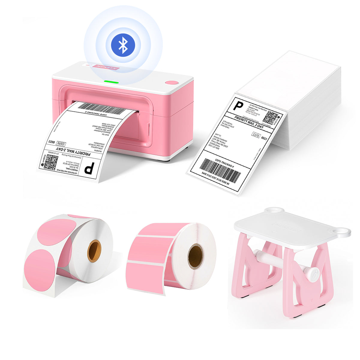 The bundle includes a pink Bluetooth thermal printer, a pink 3-in-1 label holder, one stack of shipping labels, and two rolls of pink thermal labels.