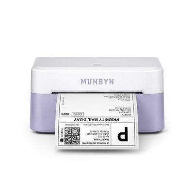 MUNBYN RealWriter 403B thermal label printer printing on a roll of labels, compact design for shipping and barcode labels.