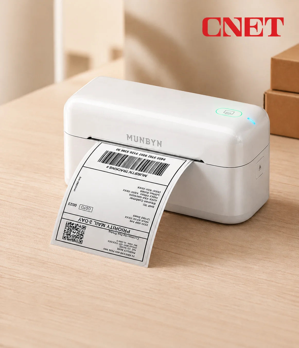 Munbyn 402B label printer on a wooden surface with a CNET logo in the background