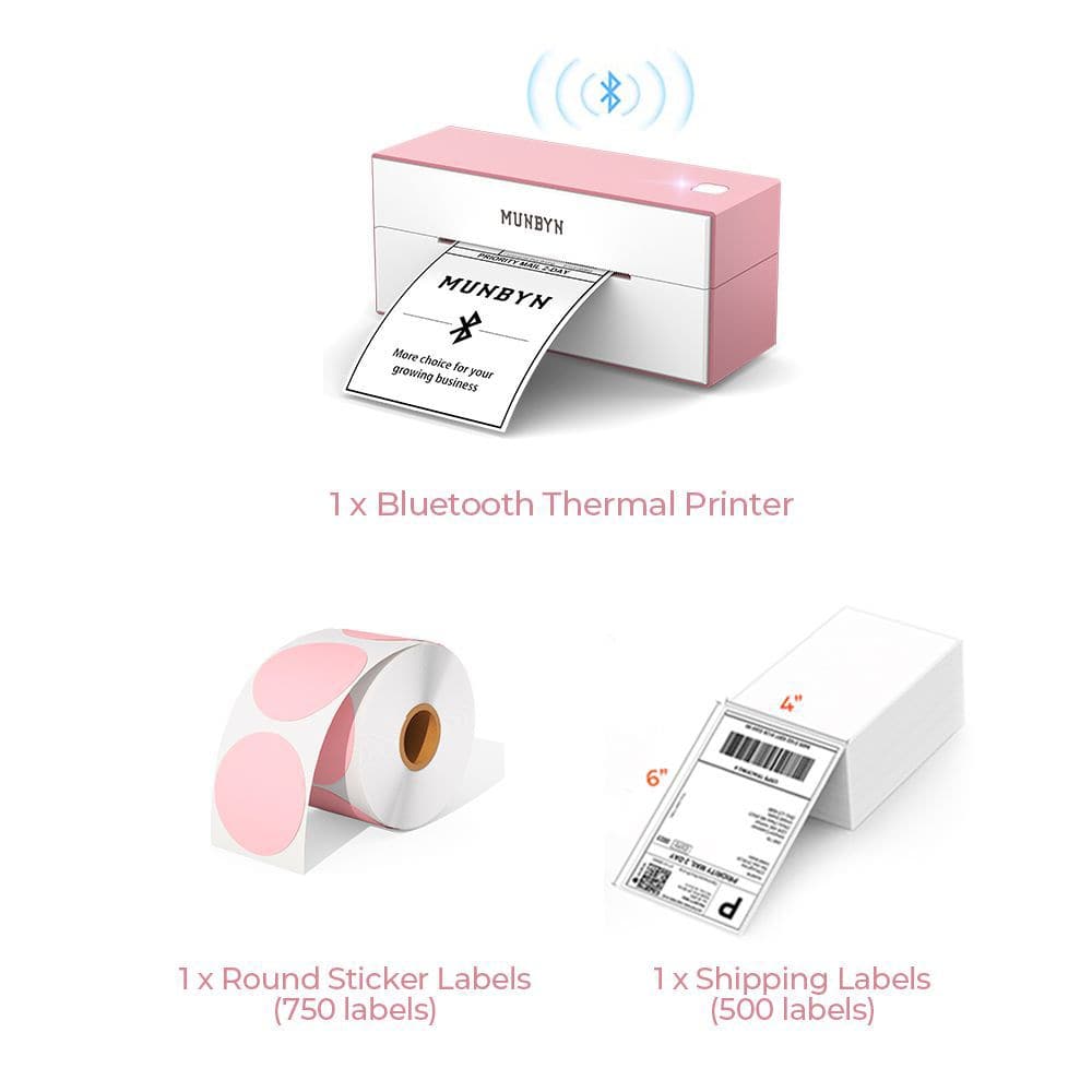 The pink Bluetooth printer kit has a pink Bluetooth shipping label printer, a roll of round labels, and a stack of fanfold shipping labels.