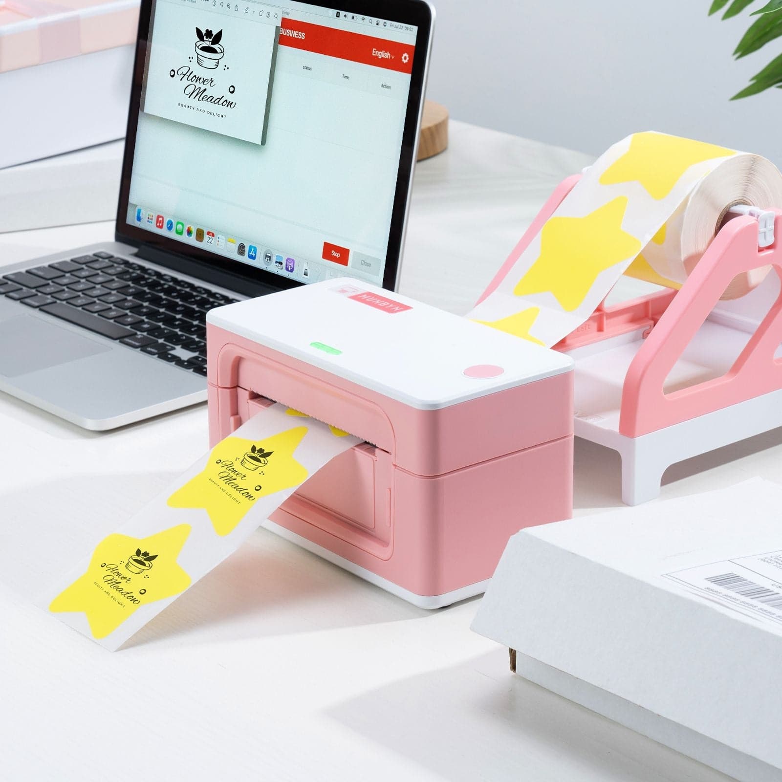 Create star stickers using a MUNBYN P941 pink thermal label printer at home office.